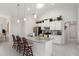Well-equipped kitchen featuring granite countertops and a large island at 5005 Sw 106Th St, Ocala, FL 34476