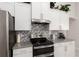 Kitchen with stainless steel appliances and granite countertops at 5005 Sw 106Th St, Ocala, FL 34476