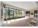 Relaxing screened porch overlooking backyard at 10061 Sw 88Th Ter, Ocala, FL 34481