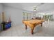 Game room featuring a full-size pool table and plenty of space at 13027 Ne 7Th Loop, Silver Springs, FL 34488