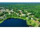 Aerial view of property location near a lake in a residential area at 13027 Ne 7Th Loop, Silver Springs, FL 34488