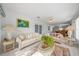 Bright living room with comfy sofas and a relaxing atmosphere at 13027 Ne 7Th Loop, Silver Springs, FL 34488