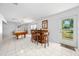 Game room features a pool table and wet bar, perfect for entertaining at 13027 Ne 7Th Loop, Silver Springs, FL 34488