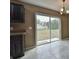 Kitchen with sliding glass door and view of backyard at 247 Malauka Loop, Ocklawaha, FL 32179