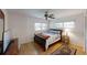 Bright bedroom with double bed and wood floors at 8420 Sw 92Nd St # A, Ocala, FL 34481