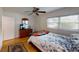 Cozy bedroom with a double bed and wood floors at 8420 Sw 92Nd St # A, Ocala, FL 34481