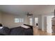 Main bedroom with hardwood floors and access to bathroom at 8420 Sw 92Nd St # A, Ocala, FL 34481
