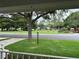 View from porch showing quiet street and green lawns at 8420 Sw 92Nd St # A, Ocala, FL 34481
