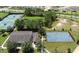 Aerial view of community tennis courts and basketball court at 9818 Sw 63Rd Loop, Ocala, FL 34481