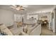 Open living room and dining area with hardwood floors and neutral colors at 9818 Sw 63Rd Loop, Ocala, FL 34481
