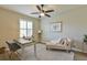 Home office with desk, chaise lounge, and wood flooring at 9818 Sw 63Rd Loop, Ocala, FL 34481