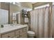 Simple bathroom with shower/tub combo and updated vanity at 9818 Sw 63Rd Loop, Ocala, FL 34481