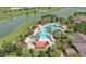 Aerial view of community pool with surrounding landscaping at 9818 Sw 63Rd Loop, Ocala, FL 34481