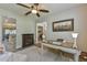 Home office with fireplace and built-in shelving at 9818 Sw 63Rd Loop, Ocala, FL 34481