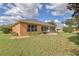 Well-maintained house with landscaped yard and patio at 9818 Sw 63Rd Loop, Ocala, FL 34481