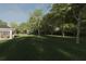 Spacious backyard with a patio and plenty of trees at Tbd Bay Trak, Ocklawaha, FL 32179