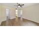 Spacious bedroom with wood-look flooring and access to bathroom at 2915 Sw 32Nd Ave # C3, Ocala, FL 34474