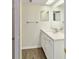 Clean bathroom with white vanity and a large mirror at 2915 Sw 32Nd Ave # C3, Ocala, FL 34474