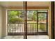 Screened porch overlooking a grassy backyard at 2915 Sw 32Nd Ave # C3, Ocala, FL 34474