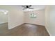 Bedroom featuring wood-look floors and a ceiling fan at 2915 Sw 32Nd Ave # C3, Ocala, FL 34474