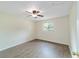 Bright bedroom with wood-look flooring and ceiling fan at 2915 Sw 32Nd Ave # C3, Ocala, FL 34474