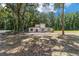 House exterior showcasing unique design and landscaping at 14260 Ne 40Th Ct, Anthony, FL 32617