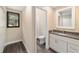 Clean bathroom with granite countertop and white cabinets at 14260 Ne 40Th Ct, Anthony, FL 32617