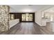 Dining room with hardwood floors and views of the backyard at 14260 Ne 40Th Ct, Anthony, FL 32617