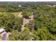 Aerial view of property showing home and driveway at 14260 Ne 40Th Ct, Anthony, FL 32617