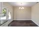 Spacious dining area with hardwood floors and French doors leading outside at 14260 Ne 40Th Ct, Anthony, FL 32617