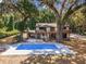 Aerial view of the house, highlighting its unique style and setting at 14260 Ne 40Th Ct, Anthony, FL 32617