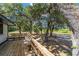 Wooden deck overlooking a tree-filled backyard at 14260 Ne 40Th Ct, Anthony, FL 32617