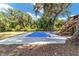 Inviting blue swimming pool surrounded by a spacious deck at 14260 Ne 40Th Ct, Anthony, FL 32617