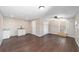 Simple interior with laminate wood floors and a small kitchenette at 14260 Ne 40Th Ct, Anthony, FL 32617