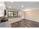 Modern kitchen with white cabinets, granite counters, and stainless steel appliances at 14260 Ne 40Th Ct, Anthony, FL 32617