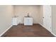 Small basement kitchenette with white cabinets and granite countertop at 14260 Ne 40Th Ct, Anthony, FL 32617