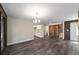 Bright dining room with hardwood floors and kitchen access at 14260 Ne 40Th Ct, Anthony, FL 32617