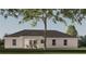 Back view of a single-story house showcasing a patio and yard at Tbd Bay Ct Pl, Ocklawaha, FL 32179