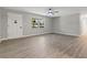 Bright living room with light gray walls and wood-look floors at 3204 Se 34Th St, Ocala, FL 34471