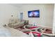 Relaxing home theater with plush seating and a large TV at 3962 Ne 58Th Cir, Silver Springs, FL 34488