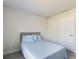 Simple bedroom with a double bed and window at 3962 Ne 58Th Cir, Silver Springs, FL 34488