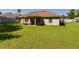 Large backyard with grassy lawn at 3962 Ne 58Th Cir, Silver Springs, FL 34488