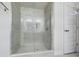 Spacious walk-in shower with glass enclosure at 3962 Ne 58Th Cir, Silver Springs, FL 34488