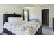 Bright bedroom with a queen-size bed and access to a bathroom at 3962 Ne 58Th Cir, Silver Springs, FL 34488