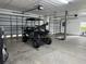 Spacious garage with golf cart and ample storage at 56633 Otter Rd, Astor, FL 32102