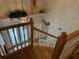 Elegant wooden staircase leading to the upper level of the home at 56633 Otter Rd, Astor, FL 32102