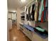 Large walk-in closet with ample shelving and hanging space at 56633 Otter Rd, Astor, FL 32102