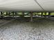 Under-house area with gravel flooring and support beams at 56633 Otter Rd, Astor, FL 32102