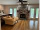Main bedroom with fireplace and access to balcony at 56633 Otter Rd, Astor, FL 32102
