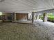 Under-house area with gravel flooring and concrete supports at 56633 Otter Rd, Astor, FL 32102